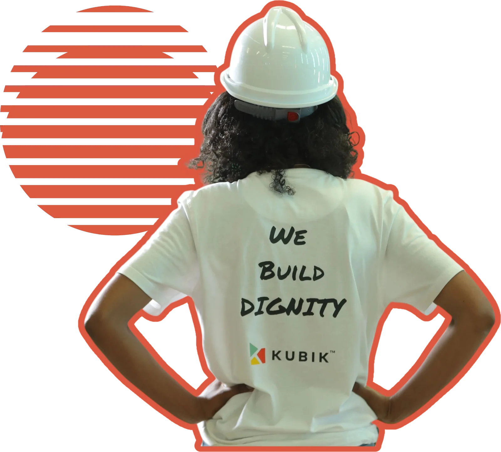 A Kubik team member seen from behind wearing a hard hat and a shirt that reads We Build Dignity